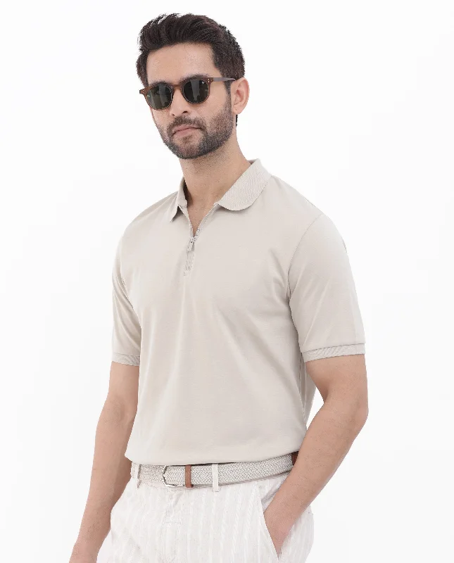 Massive markdowns on clothing items you love – Hurry before they’re gone!  Rare Rabbit Men's Holit Dusky Beige Half Sleeves Solid Polo T-Shirt