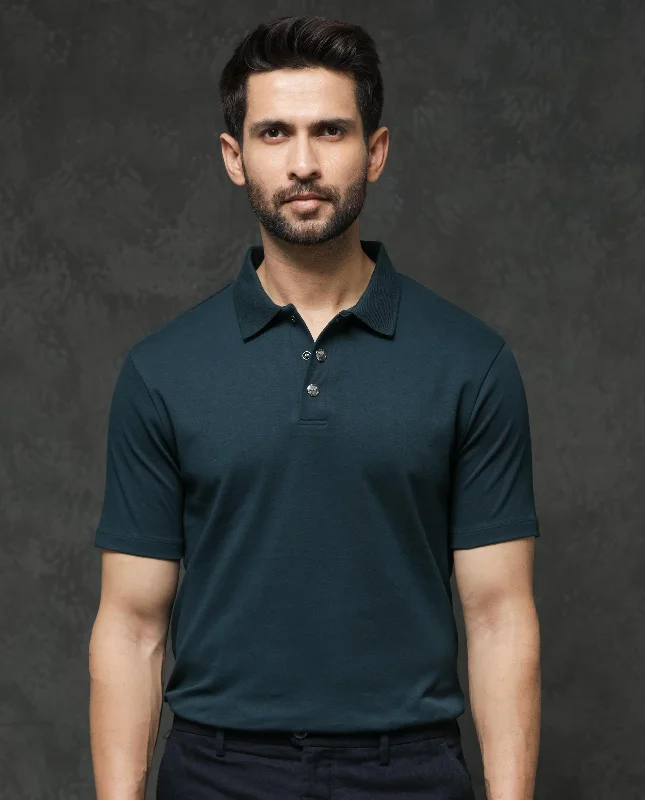 Shop new arrivals in clothing and save – Rare Rabbit Mens Tang Petrol Short Sleeve Solid Polo T-Shirt Shop new arrivals in clothing and save – Rare Rabbit Mens Tang Petrol Short Sleeve Solid Polo T-Shirt